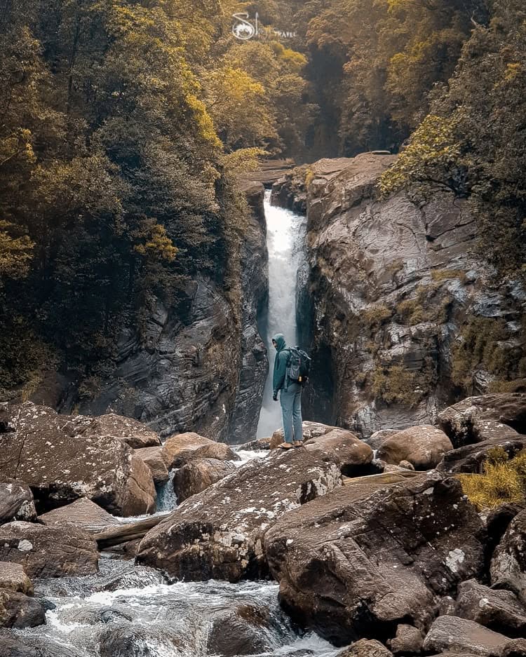 Adventure travel photography at a waterfall in Sri Lanka