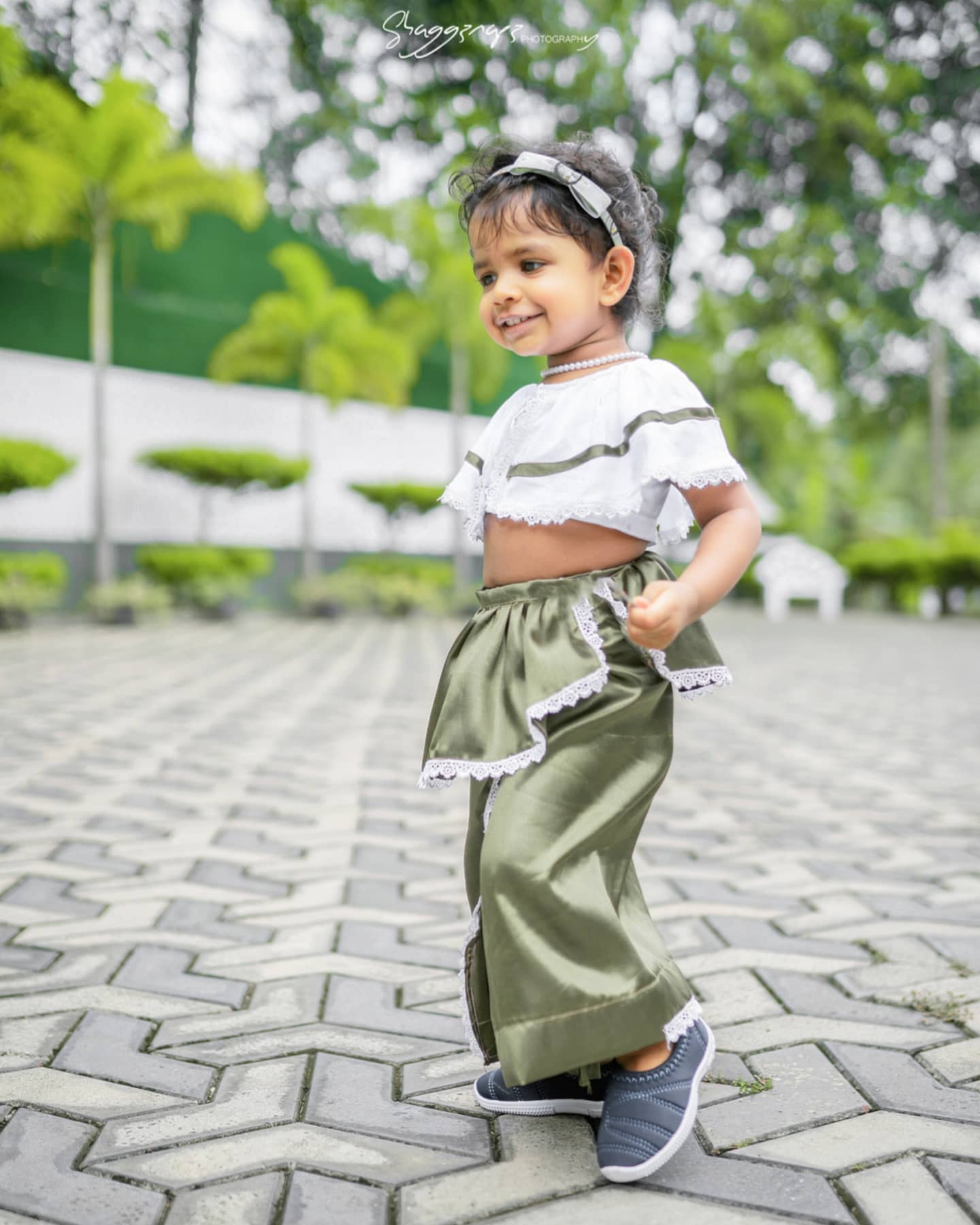 Candid baby portrait photoshoot with a playful expression in Colombo, Sri Lanka