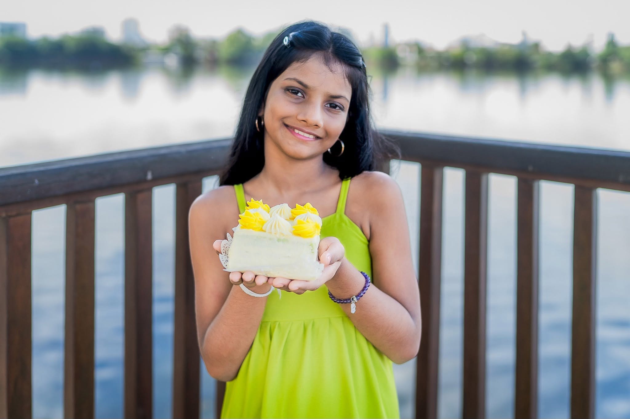 Birthday photoshoot portrait holding a slice of birthday cake in Colombo, Sri Lanka