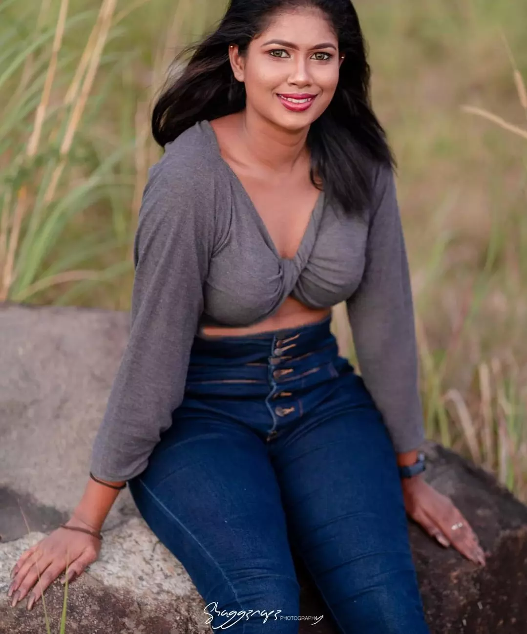 Casual portrait photoshoot seated on a rock in Colombo, Sri Lanka