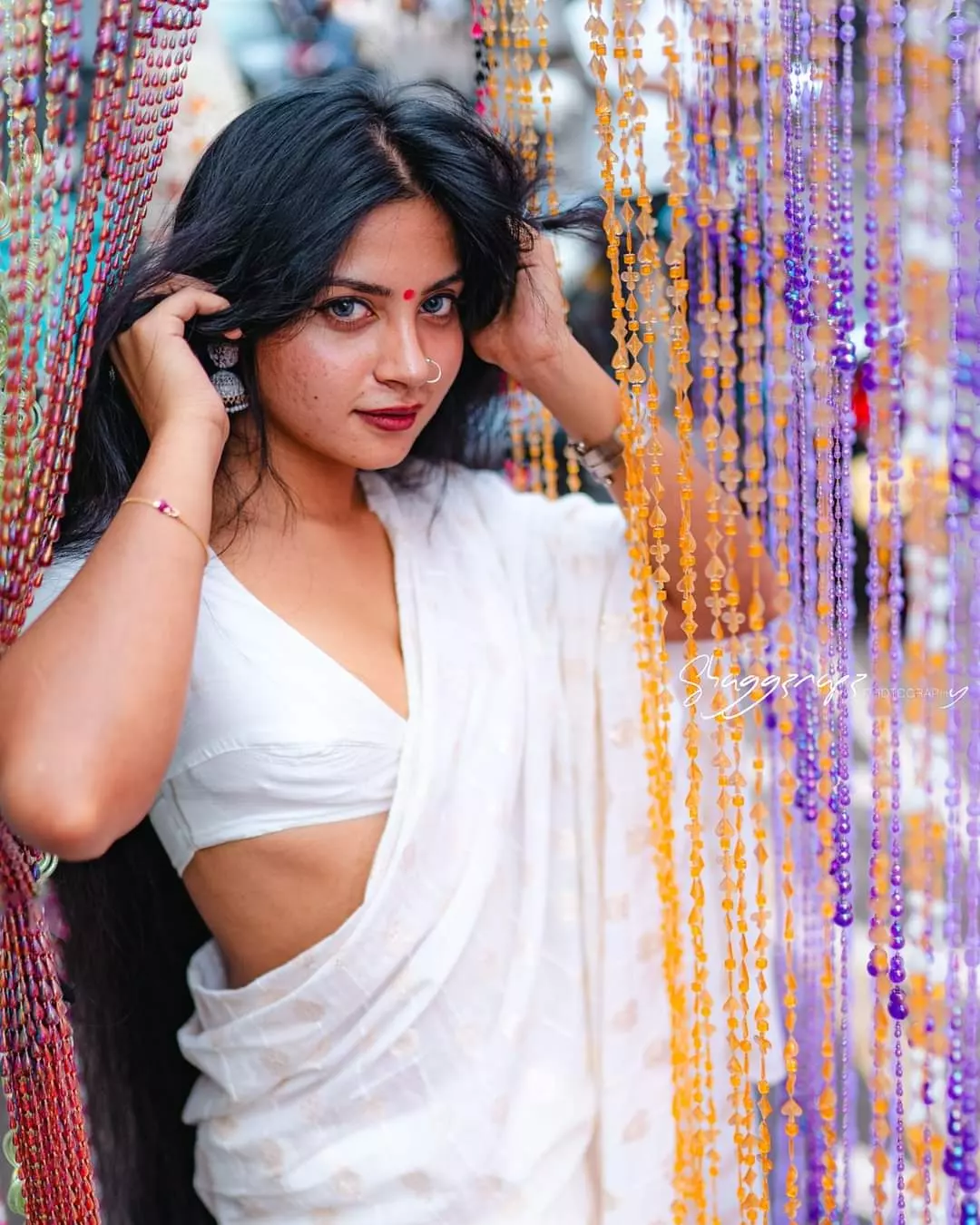 Desi fashion portrait photoshoot at a bead curtain market stall, Colombo, Sri Lanka