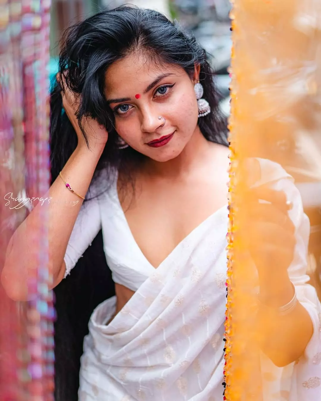 Desi fashion portrait photoshoot in a white saree at a market stall, Colombo, Sri Lanka