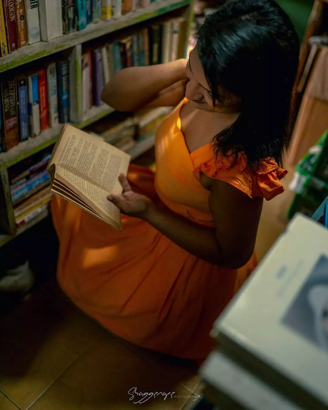 Candid fashion editorial photoshoot reading in a bookstore, Colombo, Sri Lanka