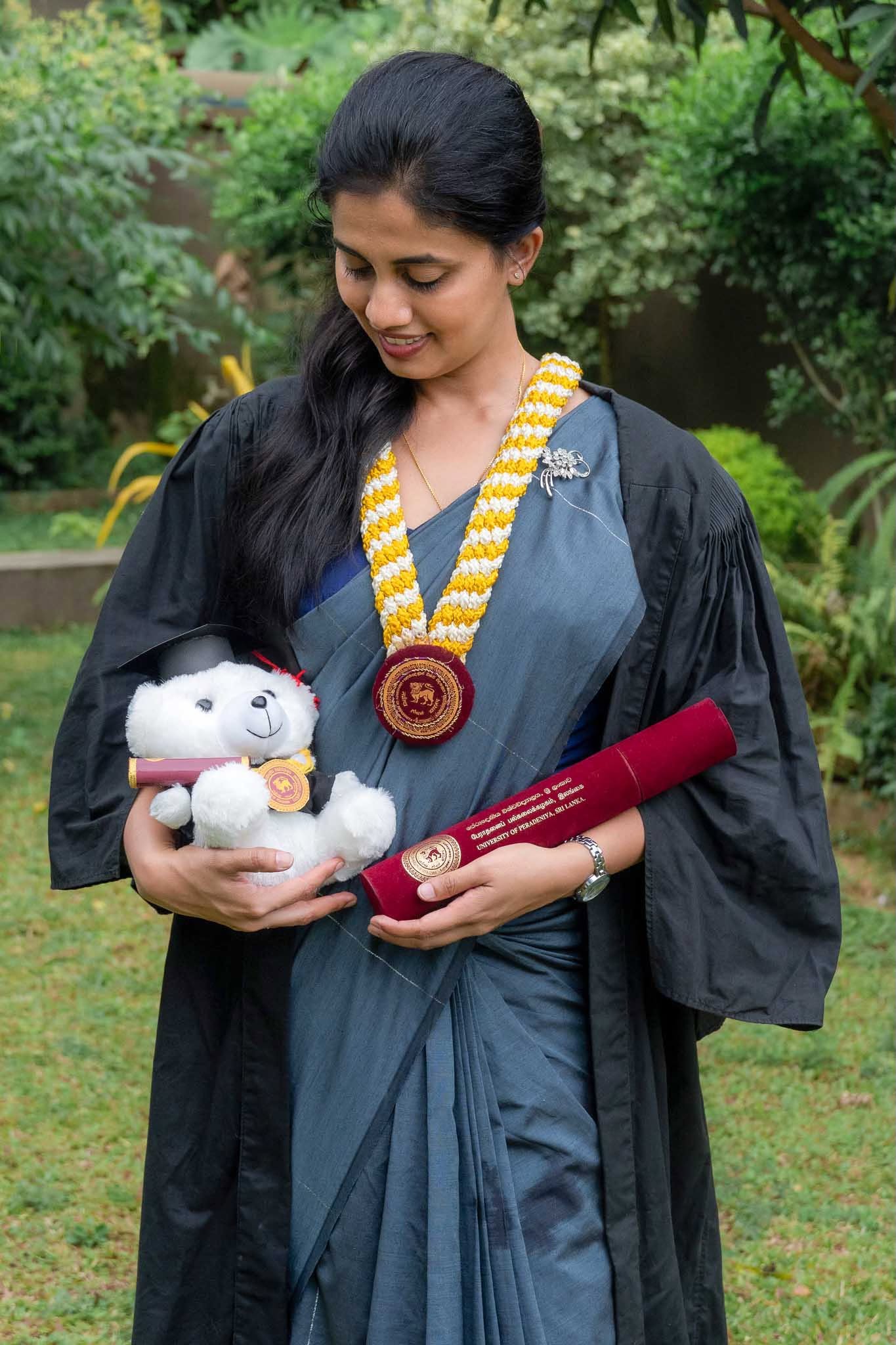 Graduation portrait photography holding a diploma scroll and teddy bear, Colombo, Sri Lanka
